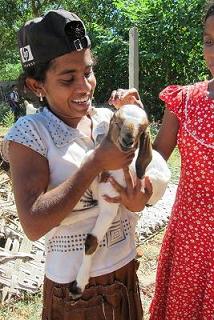 beneficiary receiving goat 2.JPG